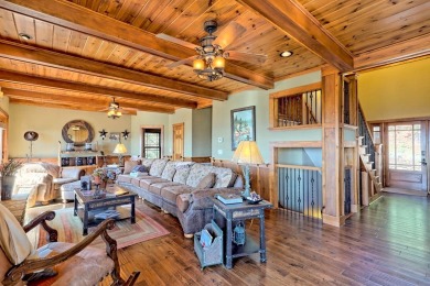 Indulge in breathtaking views from the moment you step foot in on Chatuge Shores Golf Course in North Carolina - for sale on GolfHomes.com, golf home, golf lot