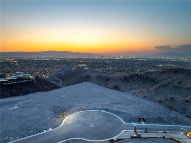 Perched 2,700 ft above the valley floor in double-gated Dragon's on Dragon Ridge Country Club in Nevada - for sale on GolfHomes.com, golf home, golf lot