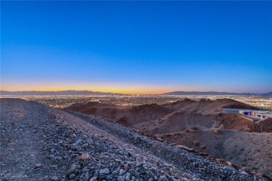 Perched 2,700 ft above the valley floor in double-gated Dragon's on Dragon Ridge Country Club in Nevada - for sale on GolfHomes.com, golf home, golf lot