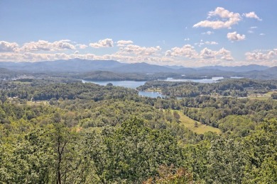 Indulge in breathtaking views from the moment you step foot in on Chatuge Shores Golf Course in North Carolina - for sale on GolfHomes.com, golf home, golf lot