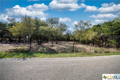 Tree shaded possible 2nd story lake view lot located in Canyon on Canyon Lake Golf Club in Texas - for sale on GolfHomes.com, golf home, golf lot