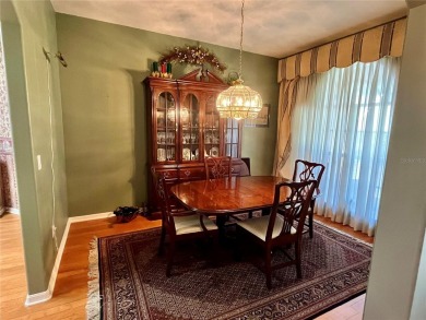 The Florida lifestyle at its finest! Lovely home on the golf on Kings Ridge Golf Club in Florida - for sale on GolfHomes.com, golf home, golf lot
