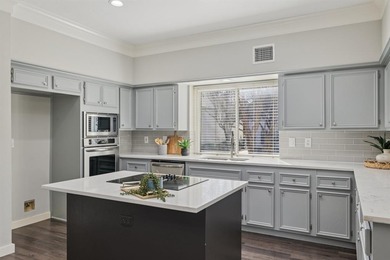 Discover this stunning 4-bedroom, 3.5-bath residence in the on Hackberry Creek Country Club in Texas - for sale on GolfHomes.com, golf home, golf lot