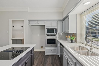 Discover this stunning 4-bedroom, 3.5-bath residence in the on Hackberry Creek Country Club in Texas - for sale on GolfHomes.com, golf home, golf lot