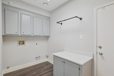 Discover this stunning 4-bedroom, 3.5-bath residence in the on Hackberry Creek Country Club in Texas - for sale on GolfHomes.com, golf home, golf lot