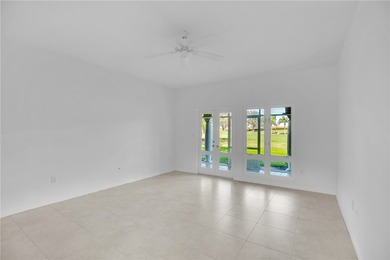 Enjoy the fabulous lifestyle of Grand Harbor! Rare 1st floor on Oak Harbor Country Club in Florida - for sale on GolfHomes.com, golf home, golf lot