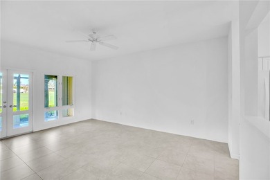 Enjoy the fabulous lifestyle of Grand Harbor! Rare 1st floor on Oak Harbor Country Club in Florida - for sale on GolfHomes.com, golf home, golf lot