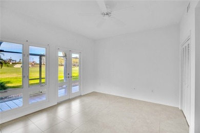 Enjoy the fabulous lifestyle of Grand Harbor! Rare 1st floor on Oak Harbor Country Club in Florida - for sale on GolfHomes.com, golf home, golf lot