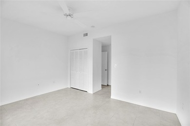 Enjoy the fabulous lifestyle of Grand Harbor! Rare 1st floor on Oak Harbor Country Club in Florida - for sale on GolfHomes.com, golf home, golf lot