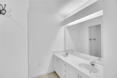 Enjoy the fabulous lifestyle of Grand Harbor! Rare 1st floor on Oak Harbor Country Club in Florida - for sale on GolfHomes.com, golf home, golf lot