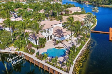 Beautiful waterfront property on a point lot with 260' of on North Palm Beach Country Club in Florida - for sale on GolfHomes.com, golf home, golf lot