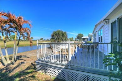 One of the best views in Barefoot Bay, overlooking both the golf on Barefoot Bay Golf Course in Florida - for sale on GolfHomes.com, golf home, golf lot