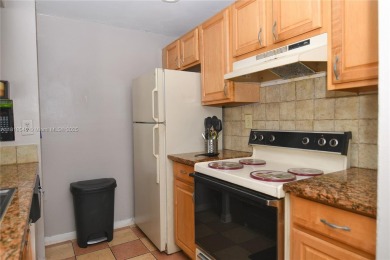 Charming 2-Bedroom Condo in Desirable Las Brisas at Country Club on Country Club of Miami in Florida - for sale on GolfHomes.com, golf home, golf lot