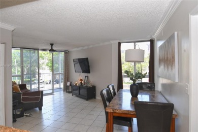 Charming 2-Bedroom Condo in Desirable Las Brisas at Country Club on Country Club of Miami in Florida - for sale on GolfHomes.com, golf home, golf lot