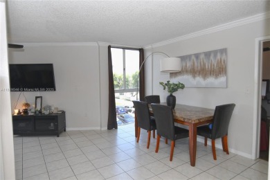 Charming 2-Bedroom Condo in Desirable Las Brisas at Country Club on Country Club of Miami in Florida - for sale on GolfHomes.com, golf home, golf lot