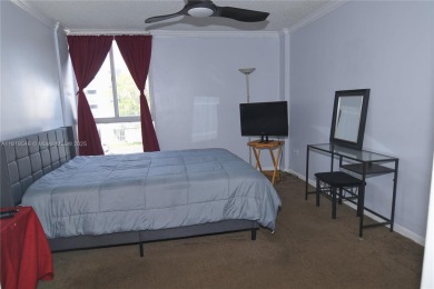 Charming 2-Bedroom Condo in Desirable Las Brisas at Country Club on Country Club of Miami in Florida - for sale on GolfHomes.com, golf home, golf lot