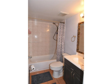 Charming 2-Bedroom Condo in Desirable Las Brisas at Country Club on Country Club of Miami in Florida - for sale on GolfHomes.com, golf home, golf lot