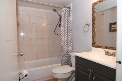 Charming 2-Bedroom Condo in Desirable Las Brisas at Country Club on Country Club of Miami in Florida - for sale on GolfHomes.com, golf home, golf lot