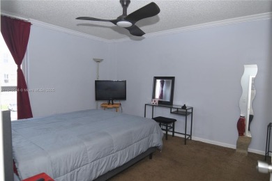 Charming 2-Bedroom Condo in Desirable Las Brisas at Country Club on Country Club of Miami in Florida - for sale on GolfHomes.com, golf home, golf lot