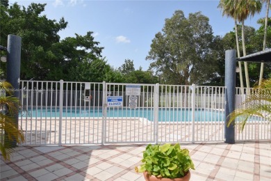 Charming 2-Bedroom Condo in Desirable Las Brisas at Country Club on Country Club of Miami in Florida - for sale on GolfHomes.com, golf home, golf lot