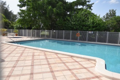 Charming 2-Bedroom Condo in Desirable Las Brisas at Country Club on Country Club of Miami in Florida - for sale on GolfHomes.com, golf home, golf lot