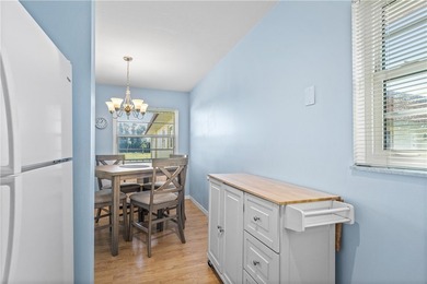 Discover the ultimate 55+ retreat in this stunning 2nd-floor on The American Golf Club in Florida - for sale on GolfHomes.com, golf home, golf lot