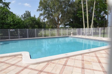 Charming 2-Bedroom Condo in Desirable Las Brisas at Country Club on Country Club of Miami in Florida - for sale on GolfHomes.com, golf home, golf lot