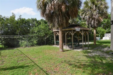 Charming 2-Bedroom Condo in Desirable Las Brisas at Country Club on Country Club of Miami in Florida - for sale on GolfHomes.com, golf home, golf lot