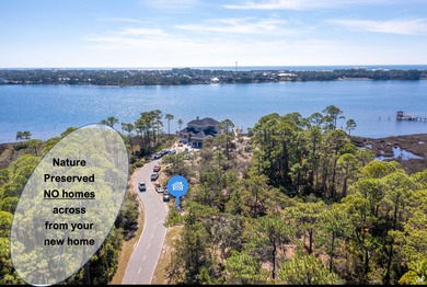 Build your dream home on this 0.26-acre waterview lot located on on Sharks Tooth Golf Club in Florida - for sale on GolfHomes.com, golf home, golf lot