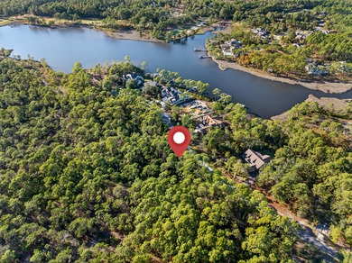 Build your dream home or vacation retreat on this spacious and on Sharks Tooth Golf Club in Florida - for sale on GolfHomes.com, golf home, golf lot