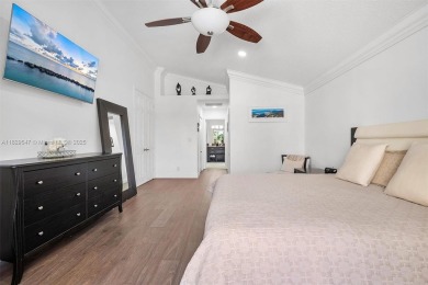 Step into a world of refined luxury and seclusion with on Weston Hills Country Club in Florida - for sale on GolfHomes.com, golf home, golf lot