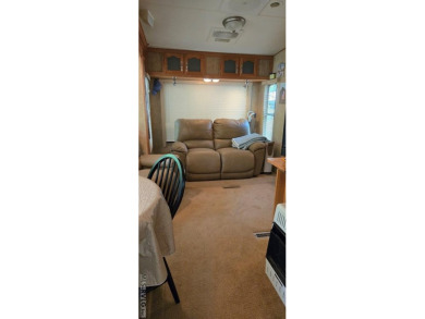 Beautifully maintained 2007 Forest River Cardinal 34' Fifth on River Ridge Golf Club in Virginia - for sale on GolfHomes.com, golf home, golf lot