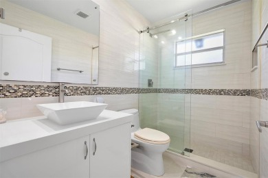 Step into a world of refined luxury and seclusion with on Weston Hills Country Club in Florida - for sale on GolfHomes.com, golf home, golf lot