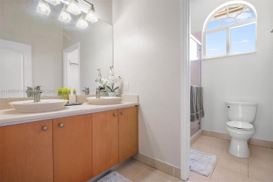 Step into a world of refined luxury and seclusion with on Weston Hills Country Club in Florida - for sale on GolfHomes.com, golf home, golf lot