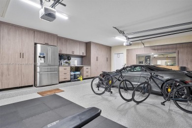 Step into a world of refined luxury and seclusion with on Weston Hills Country Club in Florida - for sale on GolfHomes.com, golf home, golf lot