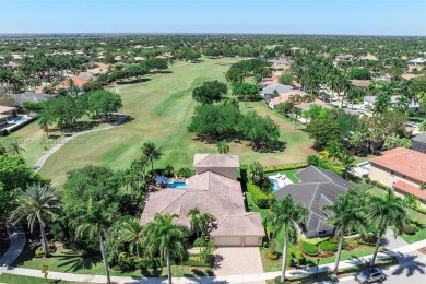 Step into a world of refined luxury and seclusion with on Weston Hills Country Club in Florida - for sale on GolfHomes.com, golf home, golf lot