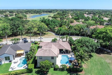 Step into a world of refined luxury and seclusion with on Weston Hills Country Club in Florida - for sale on GolfHomes.com, golf home, golf lot