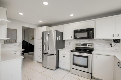 WELCOME TO THIS NATURALLY BRIGHT CONDO WITH EXPANDED SQUARE on Poinciana Golf Club in Florida - for sale on GolfHomes.com, golf home, golf lot