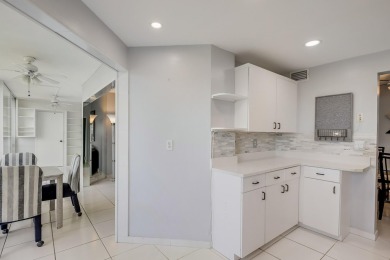 WELCOME TO THIS NATURALLY BRIGHT CONDO WITH EXPANDED SQUARE on Poinciana Golf Club in Florida - for sale on GolfHomes.com, golf home, golf lot