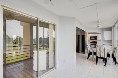 WELCOME TO THIS NATURALLY BRIGHT CONDO WITH EXPANDED SQUARE on Poinciana Golf Club in Florida - for sale on GolfHomes.com, golf home, golf lot