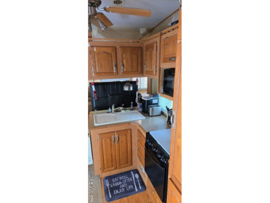 Beautifully maintained 2007 Forest River Cardinal 34' Fifth on River Ridge Golf Club in Virginia - for sale on GolfHomes.com, golf home, golf lot