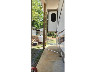 Beautifully maintained 2007 Forest River Cardinal 34' Fifth on River Ridge Golf Club in Virginia - for sale on GolfHomes.com, golf home, golf lot