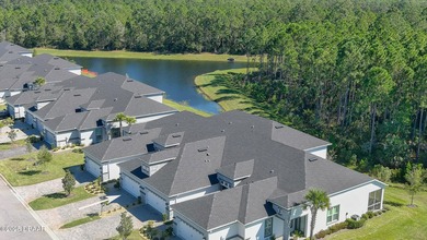Don't miss this beautifully designed 3-bedroom, 3-bath townhome on Plantation Bay Golf and Country Club in Florida - for sale on GolfHomes.com, golf home, golf lot