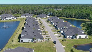 Don't miss this beautifully designed 3-bedroom, 3-bath townhome on Plantation Bay Golf and Country Club in Florida - for sale on GolfHomes.com, golf home, golf lot