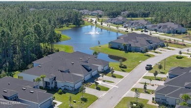 Don't miss this beautifully designed 3-bedroom, 3-bath townhome on Plantation Bay Golf and Country Club in Florida - for sale on GolfHomes.com, golf home, golf lot