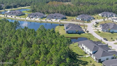 Don't miss this beautifully designed 3-bedroom, 3-bath townhome on Plantation Bay Golf and Country Club in Florida - for sale on GolfHomes.com, golf home, golf lot