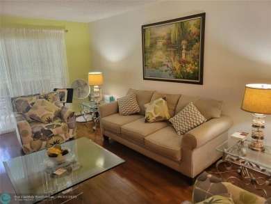 ***LOVELY 2ND FLOOR UNIT WITH SERENE VIEWS OF GOLF COURSE! on Wynmoor Golf Course in Florida - for sale on GolfHomes.com, golf home, golf lot