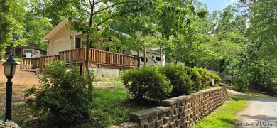 Beautifully maintained 2007 Forest River Cardinal 34' Fifth on River Ridge Golf Club in Virginia - for sale on GolfHomes.com, golf home, golf lot
