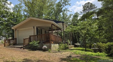 Beautifully maintained 2007 Forest River Cardinal 34' Fifth on River Ridge Golf Club in Virginia - for sale on GolfHomes.com, golf home, golf lot