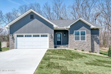 This lovely home is just a short walk to the central, paved on Druid Hills Golf Club in Tennessee - for sale on GolfHomes.com, golf home, golf lot